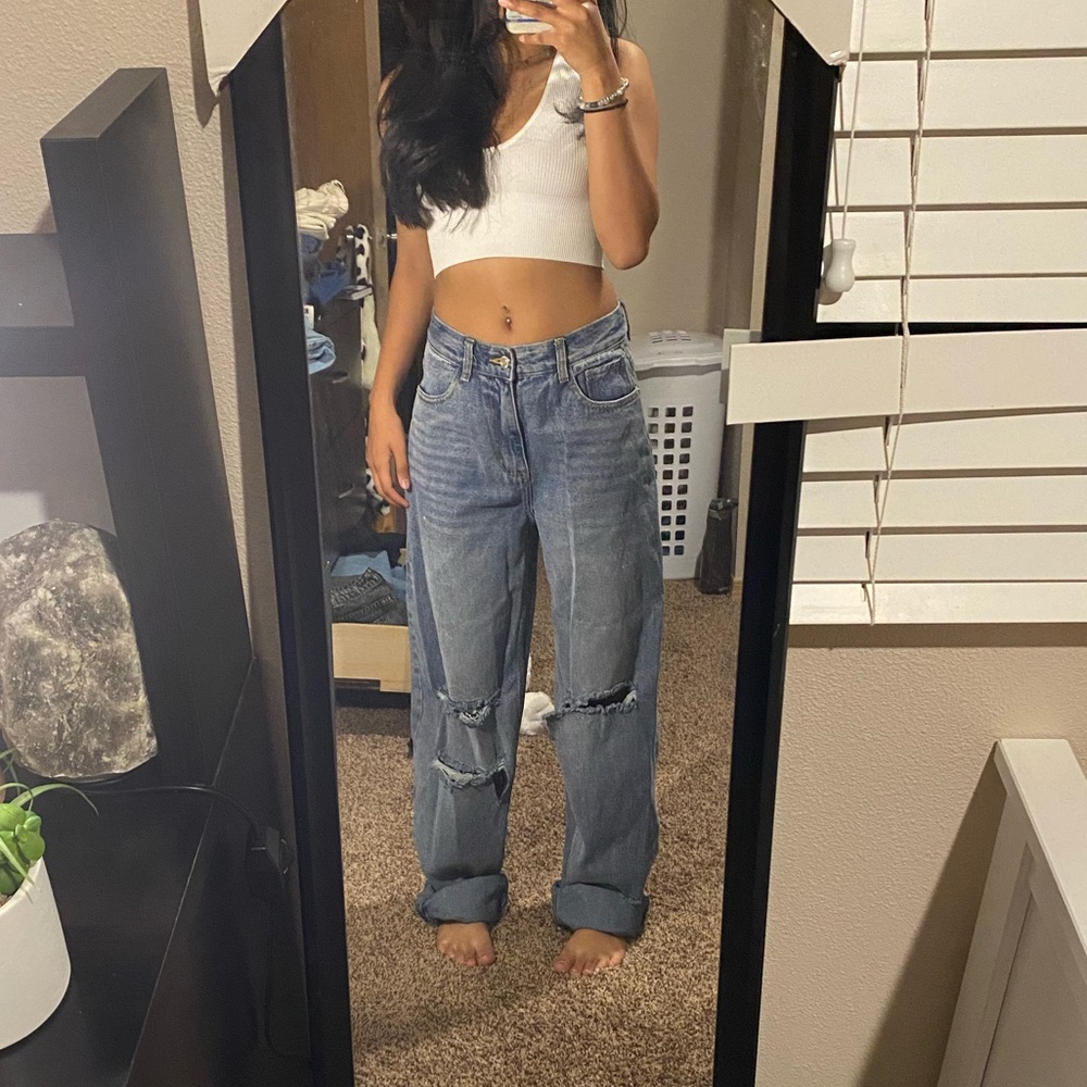 Medium washed jeans, Uk size 4, euro size 32.